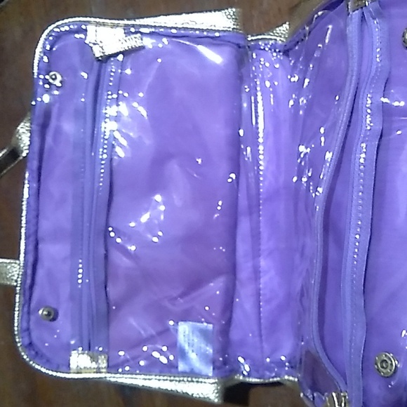 ⭐️ Gold tone makeup bag with purple on inside - Picture 3 of 5